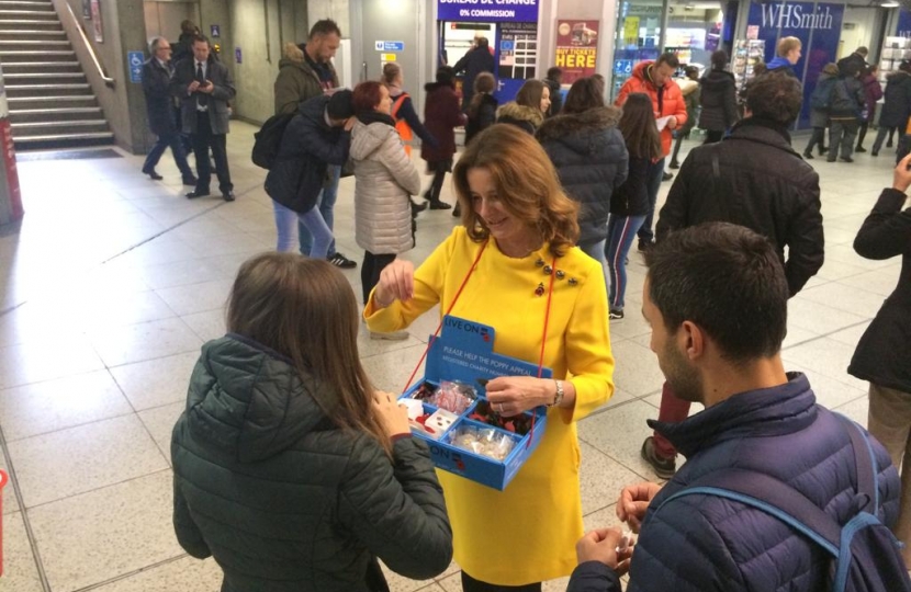 Gillian selling a poppy