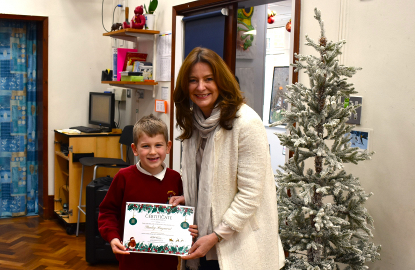 Gillian meets Stanley to award his certificate.