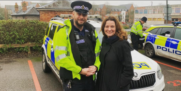 Gillian with police officer on a speed prevention day