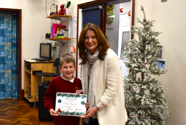 Gillian meets Stanley to award his certificate.